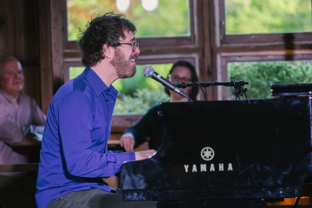 ben folds performance ct at grand piano
